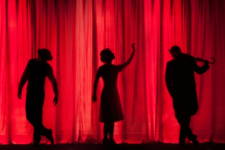 Theater stage under warm lights, representing a life devoted to performance