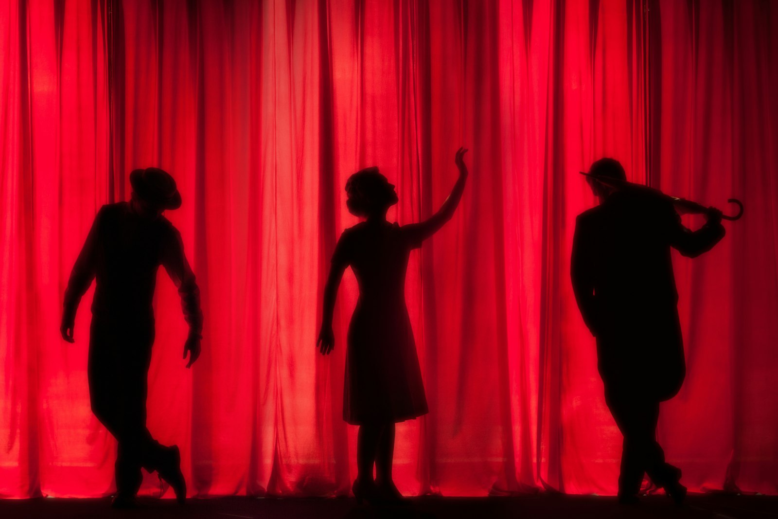 Theater stage under warm lights, representing a life devoted to performance